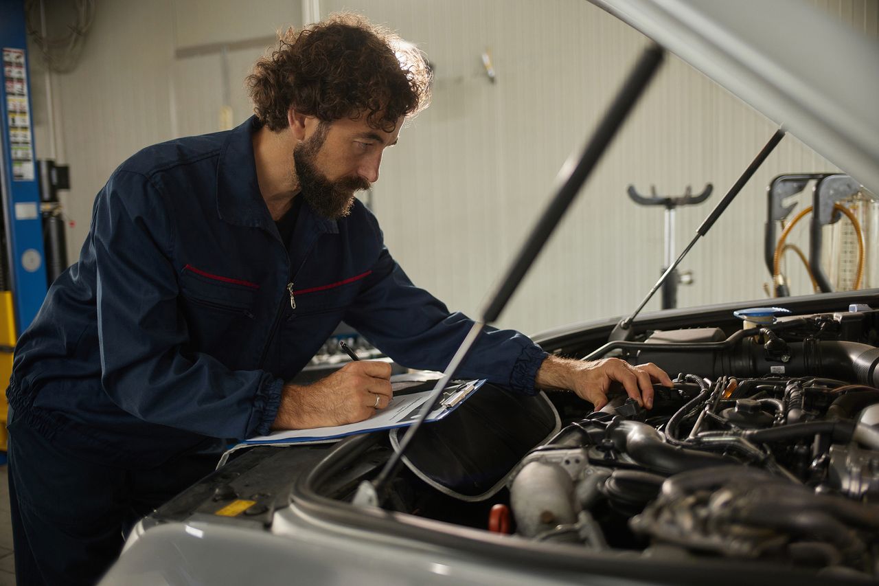 Man looking at engines